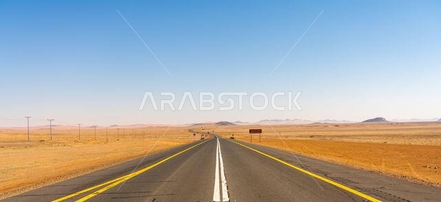 Desert of Saudi Arabia - December 15, 2024: scenic road from Riyadh to AlUla, through a landscape of sand desert, rock formations and mountains