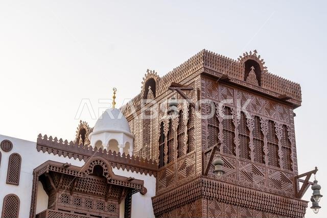 Al Tayibat City Museum in Jeddah at sunset, Saudi Arabia, with its traditional architectural design, showcases the rich cultural heritage of region Al Tayibat City Museum in Jeddah at sunset, Saudi Arabia, with its traditional architectural design, showcases the rich cultural heritage of region