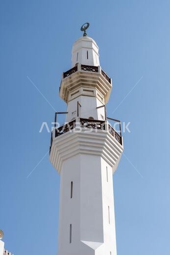 Historic Al Balad district of Jeddah, Saudi Arabia, rests peacefully on a Sunday morning, King Abdulaziz Grand Mosque standing watch over the quiet