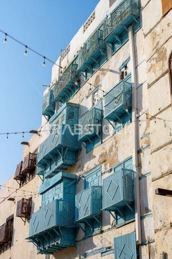 Architectural gems of Al Balad, historic heart of Jeddah, Saudi Arabia, stand serene and weathered, preserving  rich cultural heritage of the city