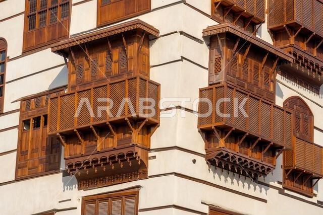 Architectural gems of Al Balad, historic heart of Jeddah, Saudi Arabia, stand serene and weathered, preserving  rich cultural heritage of the city