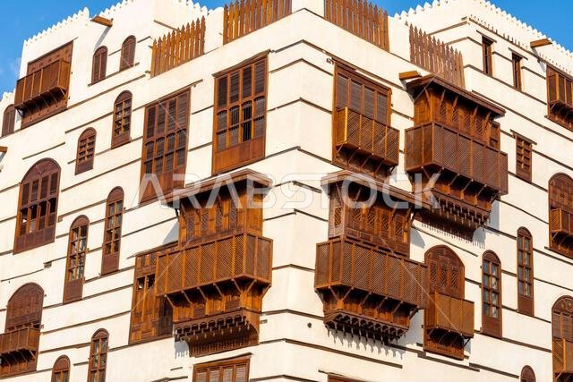 Architectural gems of Al Balad, historic heart of Jeddah, Saudi Arabia, stand serene and weathered, preserving rich cultural heritage of the city Architectural gems of Al Balad, historic heart of Jeddah, Saudi Arabia, stand serene and weathered, preserving rich cultural heritage of the city