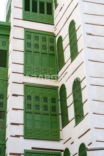 Architectural gems of Al Balad, historic heart of Jeddah, Saudi Arabia, stand serene and weathered, preserving  rich cultural heritage of the city