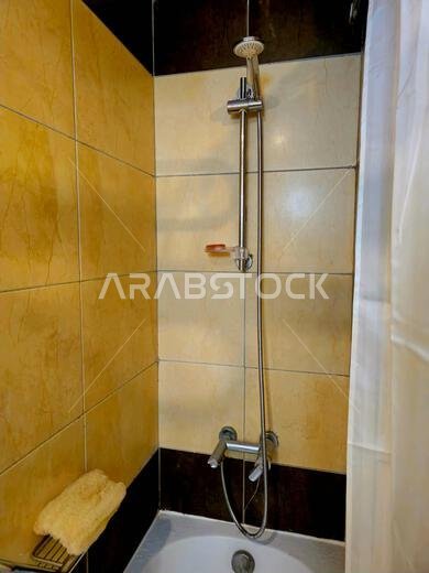 Mecca, Saudi Arabia, June 26 2024: shower inside a bathroom of hotel in Makkah city