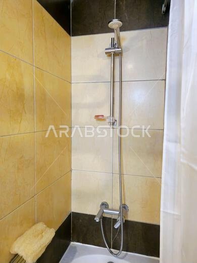 Mecca, Saudi Arabia, June 26 2024: shower inside a bathroom of hotel in Makkah city