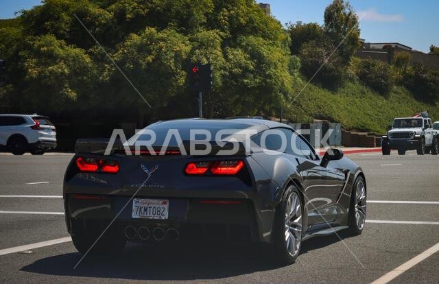 A Corvette C7 on an American road, Orange County, California, USA A Corvette C7 on an American road, Orange County, California, USA