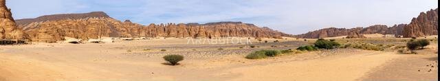 AlUla, Saudi Arabia - December 17, 2024: Dramatic sandstone rock formations of Ashar Valley frame Maraya concert hall and luxurious resorts, natural a