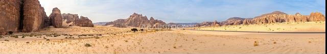 AlUla, Saudi Arabia - December 17, 2024: Dramatic sandstone rock formations of Ashar Valley frame Maraya concert hall and luxurious resorts, natural a