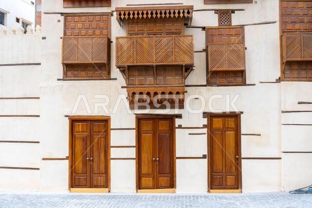 Jeddah, Saudi Arabia - December 20, 2024: Architectural gems of Al Balad, historic heart of Jeddah, Saudi Arabia, stand serene and weathered, preservi