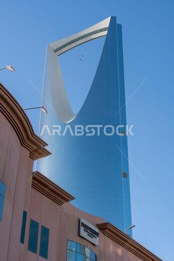 Riyadh, Saudi Arabia - December 22, 2024: The Kingdom Centre in Riyadh, Saudi Arabia, with its distinctive skyscraper design and gleaming facade, symb