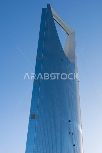 Riyadh, Saudi Arabia - December 22, 2024: The Kingdom Centre in Riyadh, Saudi Arabia, with its distinctive skyscraper design and gleaming facade, symb