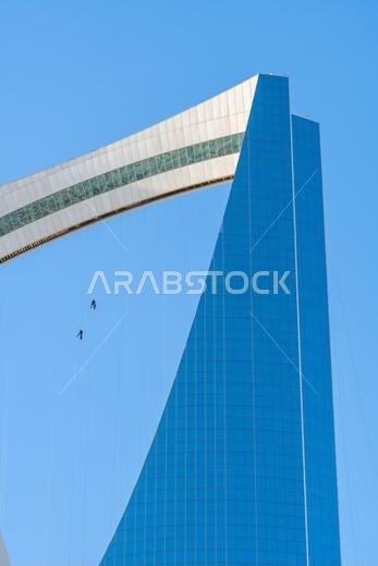 Riyadh, Saudi Arabia - December 22, 2024: The Kingdom Centre in Riyadh, Saudi Arabia, with its distinctive skyscraper design and gleaming facade, symb