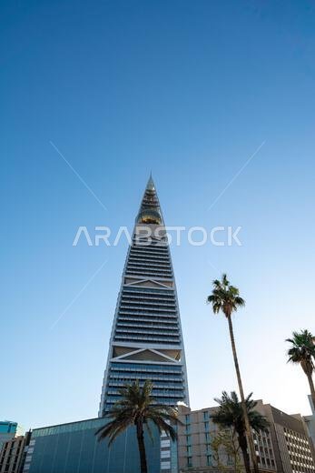Riyadh, Saudi Arabia - December 22, 2024: Al Faisaliah Tower in Riyadh, Saudi Arabia, with its distinctive skyscraper design and gleaming facade, symb