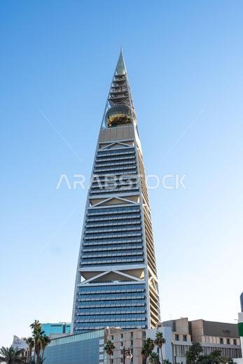 Riyadh, Saudi Arabia - December 22, 2024: Al Faisaliah Tower in Riyadh, Saudi Arabia, with its distinctive skyscraper design and gleaming facade, symb