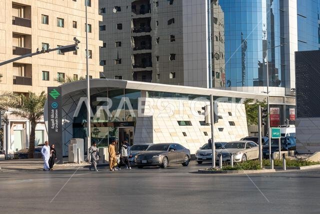 Riyadh, Saudi Arabia - December 22, 2024: Walking at sunset in Olaya Street among the modern skyscrapers of downtown Riyadh, Saudi Arabia