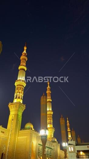 Medina, Saudi Arabia - March 6, 2024: Beautiful exterior architecture of the Masjid an-Nabawi at dawn Medina, Saudi Arabia - March 6, 2024: Beautiful exterior architecture of the Masjid an-Nabawi at dawn