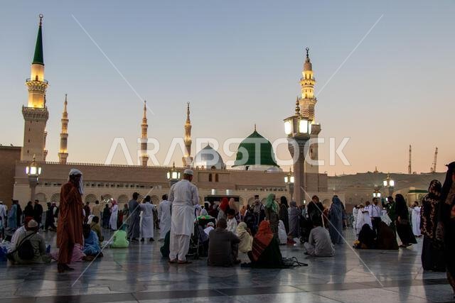 Medina - Saudi Arabia: 1 October 2024. Sunset time in Medina city. Muslims waiting for the maghrib prayer in the courtyard of the Masjid Nabawi.