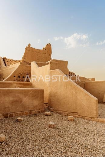 Ancient mud-brick walls and restored buildings in Ad Diriyah, Riyadh, Saudi Arabia. UNESCO World Heritage site showcasing traditional Najdi architectu