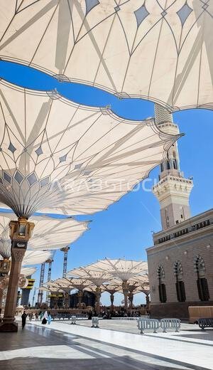 Medina, Saudi Arabia - March 6, 2024: The atmosphere in the courtyard of Al-Masjid an-Nabawi before prayer
