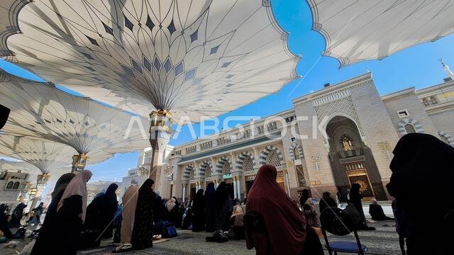Medina, Saudi Arabia - March 6, 2024: The atmosphere in the courtyard of Al-Masjid an-Nabawi before prayer