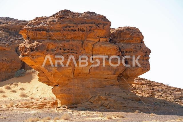Eroded rock shaped like a face at AlUla in the Arabian desert