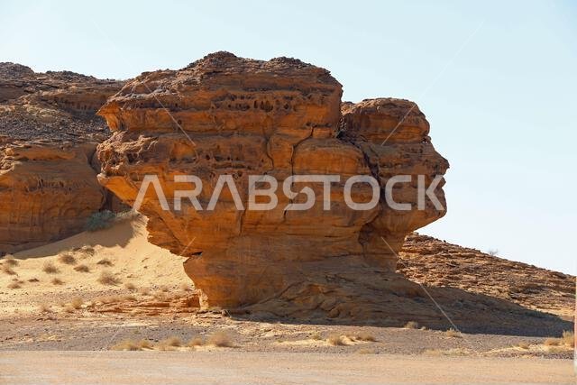 Eroded rock shaped like a face at AlUla in the Arabian desert