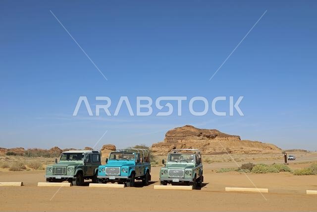 Vintage Land Rovers in use for tourists at AlUla in the Arabian Desert