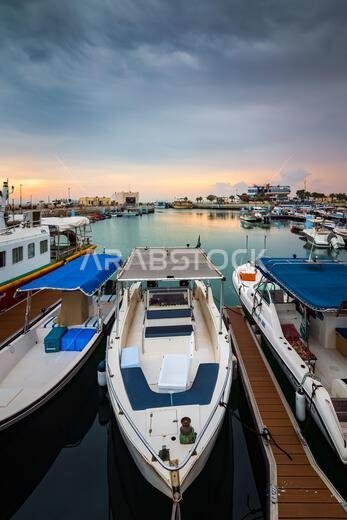 Golden Hour Harbor: Capturing the Tranquil Beauty of Sunrise in Fanateer Beach's Boats Yard, Al Jubail City,Saudi Arabia