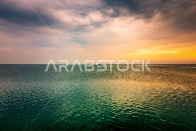 Golden Hour Harbor: Capturing the Tranquil Beauty of Sunrise in Fanateer Beach, Al Jubail City,Saudi Arabia.