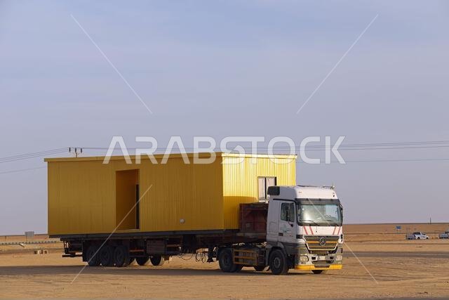 Lorry loaded with a prefabricated building in Saudi Arabia