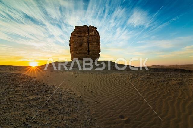 Judah thumb or devil thumb is a rock formation in the desert near Riyadh, Saudi Arabia sunrise background. Judah thumb or devil thumb is a rock formation in the desert near Riyadh, Saudi Arabia sunrise background.