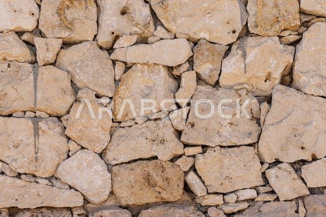 Middle East, Saudi Arabia, Tabuk, Duba. Detail of a dry stone masonary wall.