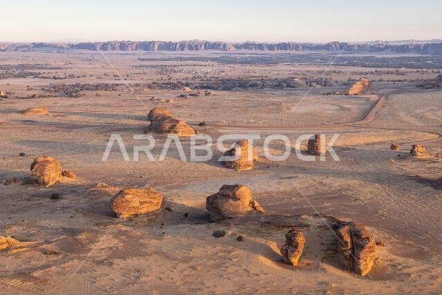 Middle East, Saudi Arabia, Medina, Al-Ula. Rock formations in the Saudi Arabian desert, seen from a hot air balloon.