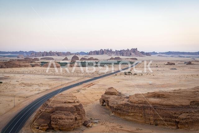 Middle East, Saudi Arabia, Medina, Al-Ula. Highway in the Saudi Arabian desert, seen from a hot air balloon.