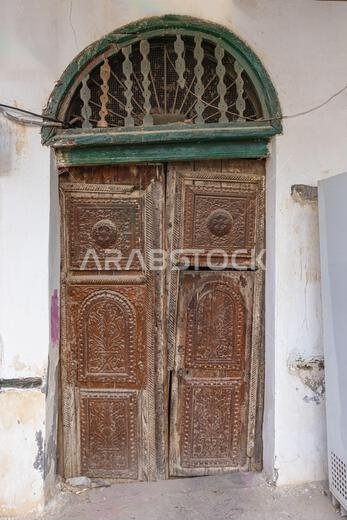 Middle East, Saudi Arabia, Mecca, Jeddah, Al-Balad. Door on a traditional Hijazi tower house in the Al-Balad historical district.
