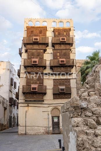 Middle East, Saudi Arabia, Mecca, Jeddah, Al-Balad. Traditional Hijazi tower house with wooden Rosan windows and balconies.