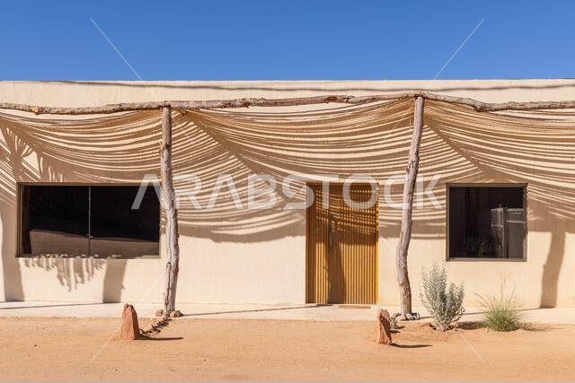 Middle East, Saudi Arabia, Medina, Al-Ula, Hegra. Shadows from a sun shade on a building near Hegra.