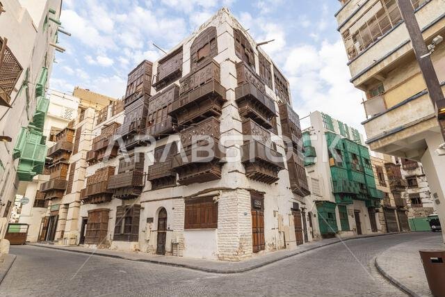 Middle East, Saudi Arabia, Mecca, Jeddah, Al-Balad. Traditional Hijazi tower house with wooden Rosan windows and balconies.