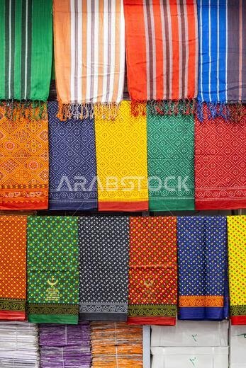 Middle East, Saudi Arabia, Mecca, Jeddah, Al-Balad. Colorful cloth in the Al-Balad historical district of Jeddah.