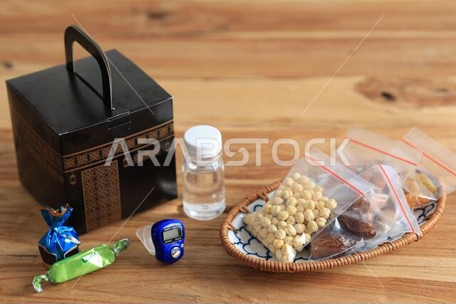 Oleh-oleh Haji Indonesia, Zam-Zam Water, various Nuts, Chocolate, Digital Counter, Raisin,  and Dates