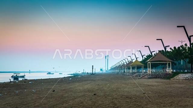 Dammam Corniche, Saudi Arabia, awakens to a peaceful morning, offering a captivating blend of the urban skyline and the calming waters, creating an id