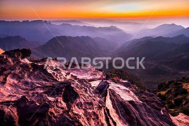 Colorful landscape background at sunrise in the Asir Mountains in Saudi Arabia.