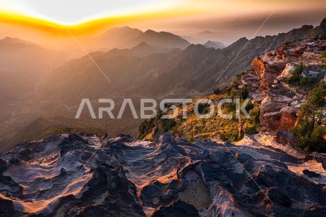 Colorful landscape background at sunrise in the Asir Mountains in Saudi Arabia.
