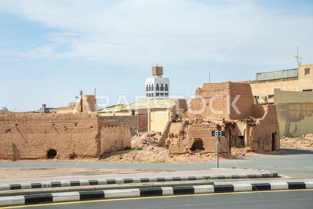 Arabian castle ruined watch tower and wall on the streets of Hail, Saudi Arabia