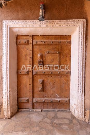 Ushaiger Heritage Village, Riyadh, Saudi Arabia, Middle East. Ornate doorway in the Ushaiger Heritage Village. Ushaiger Heritage Village, Riyadh, Saudi Arabia, Middle East. Ornate doorway in the Ushaiger Heritage Village.