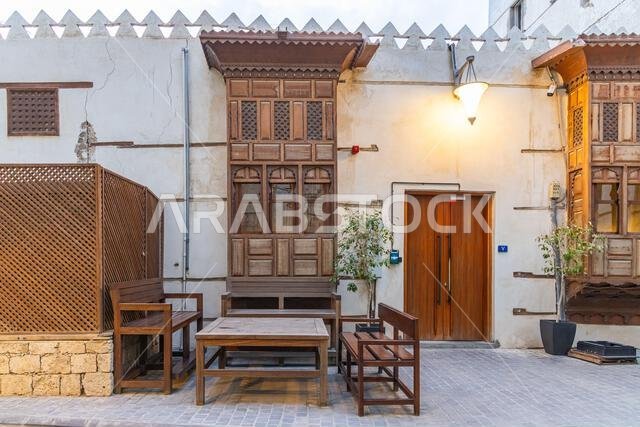 Middle East, Saudi Arabia, Mecca Province, Jeddah. November 21, 2023. Outdoor seating on a street in the Al-Balad historical district.