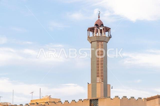 Middle East, Saudi Arabia, Al-Qassim, Unaizah. Minaret on a mosque in Unaizah. Middle East, Saudi Arabia, Al-Qassim, Unaizah. Minaret on a mosque in Unaizah.