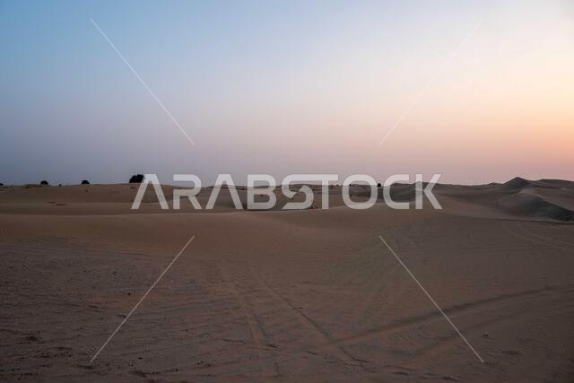 Al Qudra empty quarter seamless desert sahara in Dubai UAE middle east with wind paths and sand hills under sunset Al Qudra empty quarter seamless desert sahara in Dubai UAE middle east with wind paths and sand hills under sunset