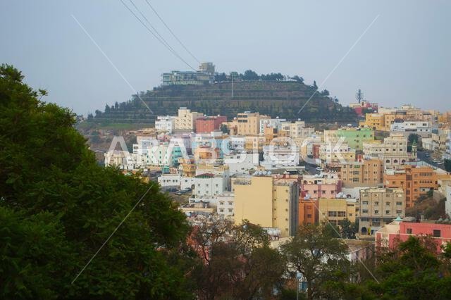A scenic view of a residential hillside seen from Green Mountain in Abha, Saudi Arabia