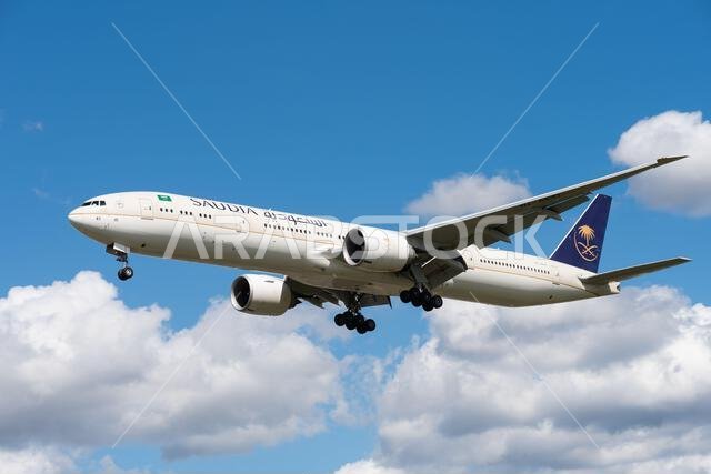 Saudia, Saudi Arabian Airlines, Boeing 777-300/ER jet airliner plane HZ-AK41 on finals to land at London Heathrow Airport, UK. Saudi long haul flight